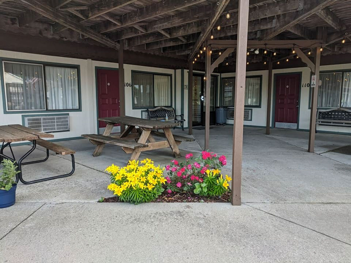 Exterior photo of The Sturgis Motel picnic area.