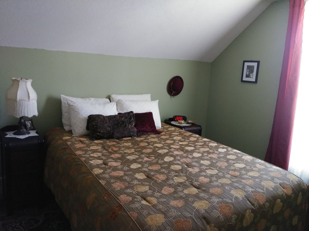 Interior photo of of one of the bedrooms in Poker's Palace.