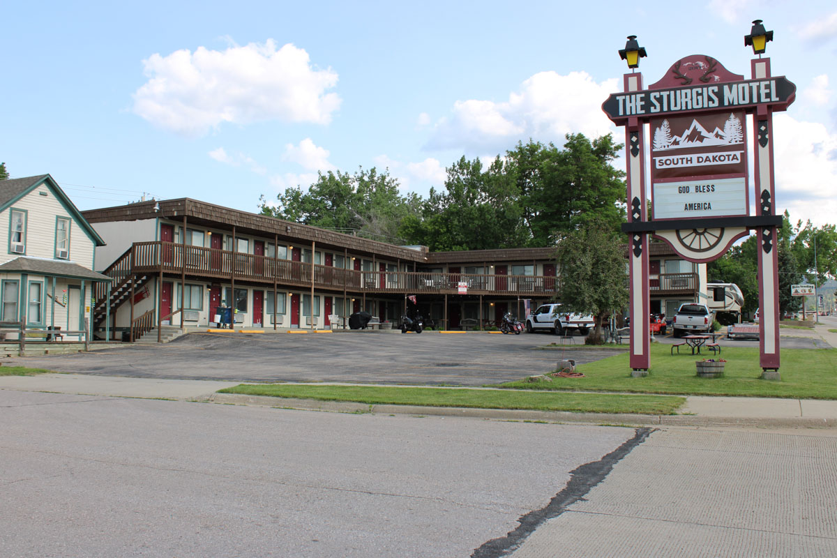Exterior photo of the sign at The Sturgis Motel.